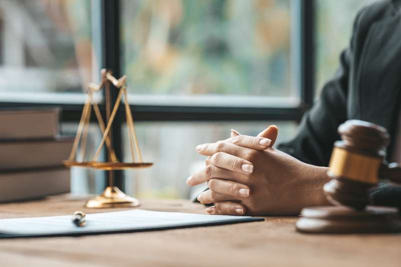 Woman lawyer sitting in office