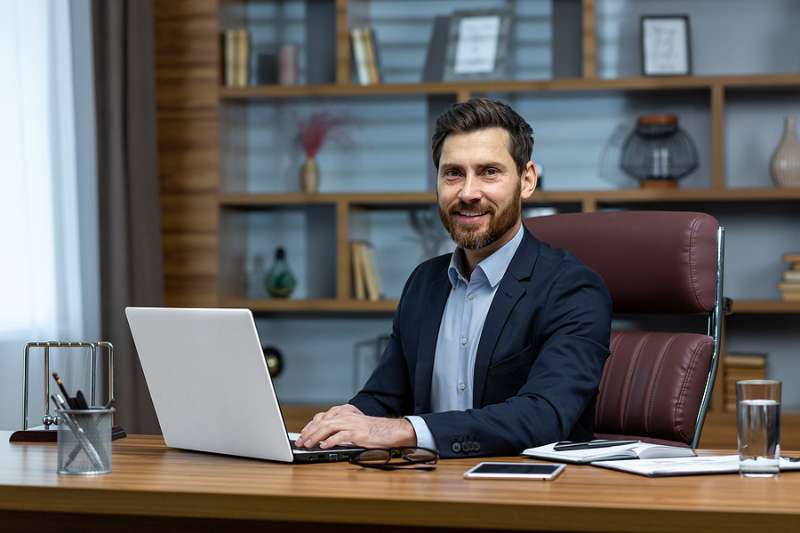 image of man at desk