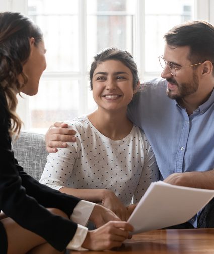 Financial Advisor Consulting Diverse Young Family Couple